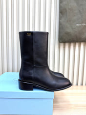 PRADA 25S LOW-CUT BOOTS IN BLACK LAMBSKIN