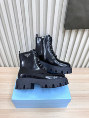 PRADA 25S MONOLITH BOOTS IN BLACK GLOSSY CALFSKIN