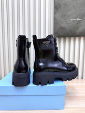 PRADA 25S MONOLITH BOOTS IN BLACK GLOSSY CALFSKIN