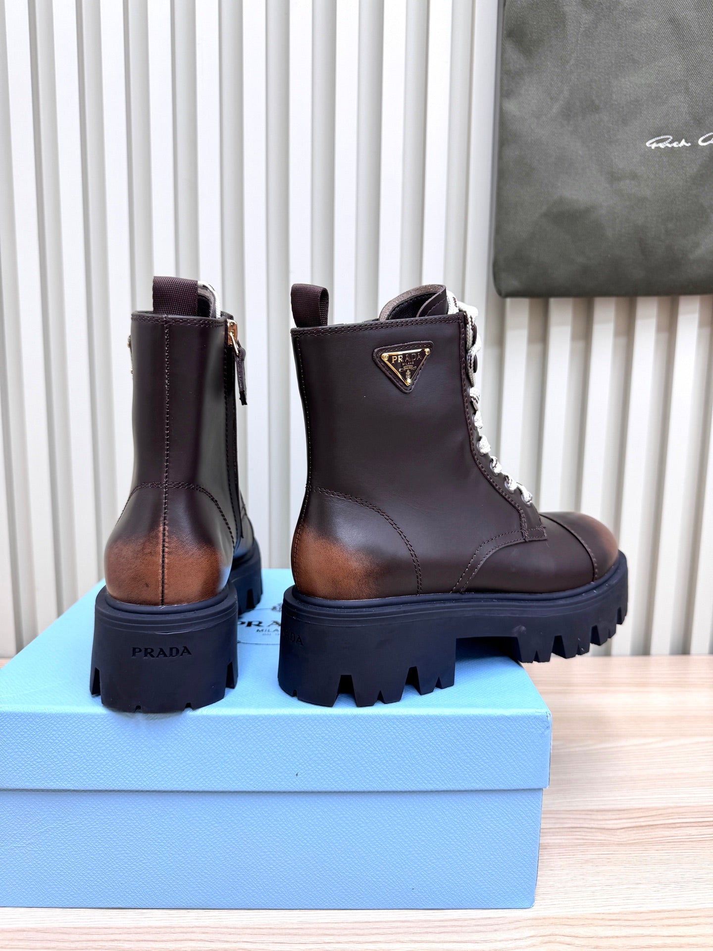 PRADA 25S MONOLITH BOOTS IN DARK BROWN CALFSKIN