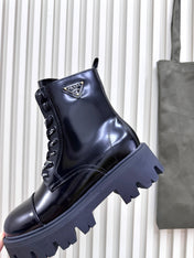 PRADA 25S MONOLITH BOOTS IN BLACK GLOSSY CALFSKIN