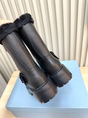 PRADA 25S MARTIN BOOTS IN BLACK CALFSKIN FUR-LINED