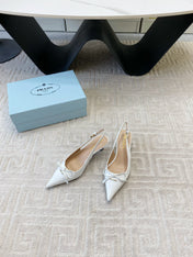 SLINGBACK PUMPS ATTACHED BOW IN WHITE GLOSSY CALFSKIN