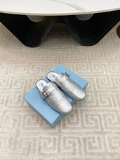 TASSEL MULES IN SILVER METALLIC LAMBSKIN