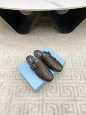 TASSEL MULES IN WALNUT BROWN LAMBSKIN