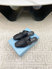 TASSEL MULES IN BLACK LAMBSKIN