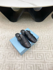 TASSEL MULES IN BLACK LAMBSKIN