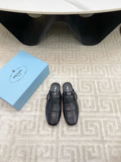 TASSEL MULES IN BLACK LAMBSKIN