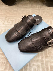 TASSEL MULES IN BLACK LAMBSKIN