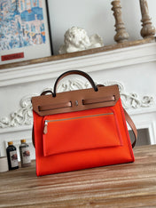 ZIP CABINE 31 BAG IN FIRE ORANGE CANVAS AND BRONZE BROWN CALFSKIN