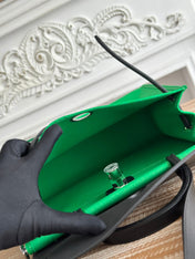 ZIP CABINE 31 BAG IN EMERALD GREEN CANVAS AND BLACK CALFSKIN