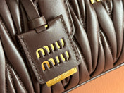 ARCADIE MATELASSÉ BAG 27 IN CONGO BROWN CALFSKIN GOLD HARDWARE