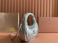 WANDER MATELASSÉ HANDBAG 23 IN SILVER PATENT LAMBSKIN