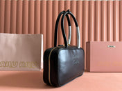 BEAU TOP HANDLE BAG 29 IN BLACK GLOSSY CALFSKIN