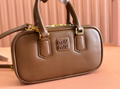 ARCADIE BAG 19 IN TAWNY BROWN SHINY CALFSKIN