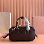 ARCADIE BAG 19 IN TAMARIND BROWN SHINY CALFSKIN