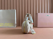 ARCADIE MATELASSÉ BAG 19 IN NUDE CALFSKIN GOLD HARDWARE