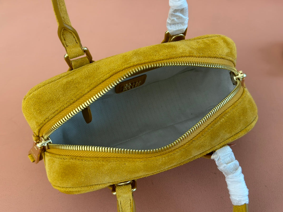 ARCADIE BAG 22 IN MUSTARD YELLOW SUEDE GOLD HARDWARE