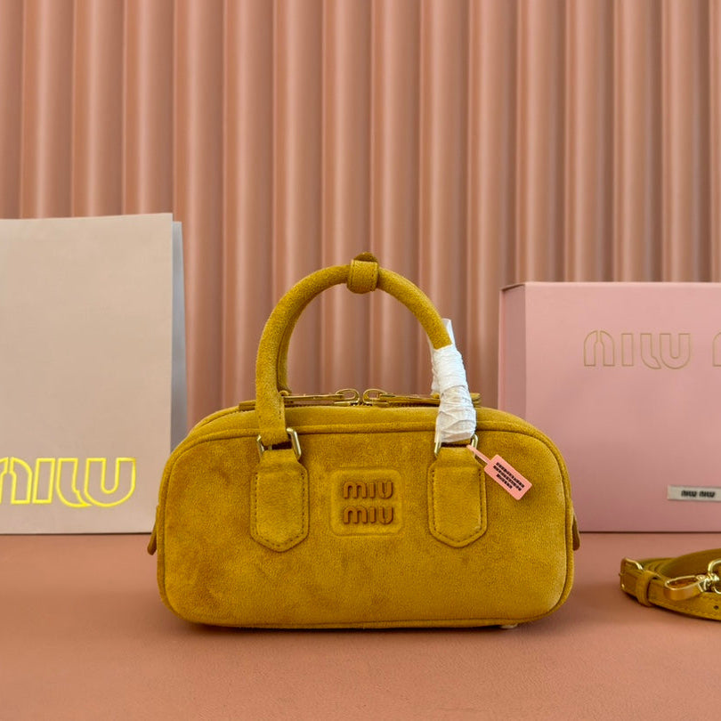 ARCADIE BAG 22 IN MUSTARD YELLOW SUEDE GOLD HARDWARE