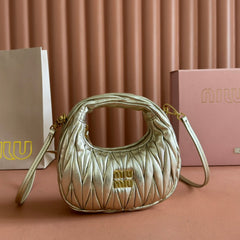 WANDER MATELASSÉ NAPPA MINI BAG 18 IN GOLDEN LAMBSKIN