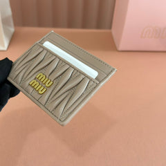 MM MATELASSÉ CARD HOLDER 10.5 IN BEIGE CALFSKIN
