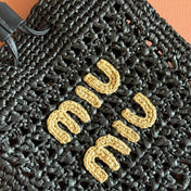 WANDER BUCKET BAG 23 BLACK IN RAFFIA WITH LEATHER TRIM