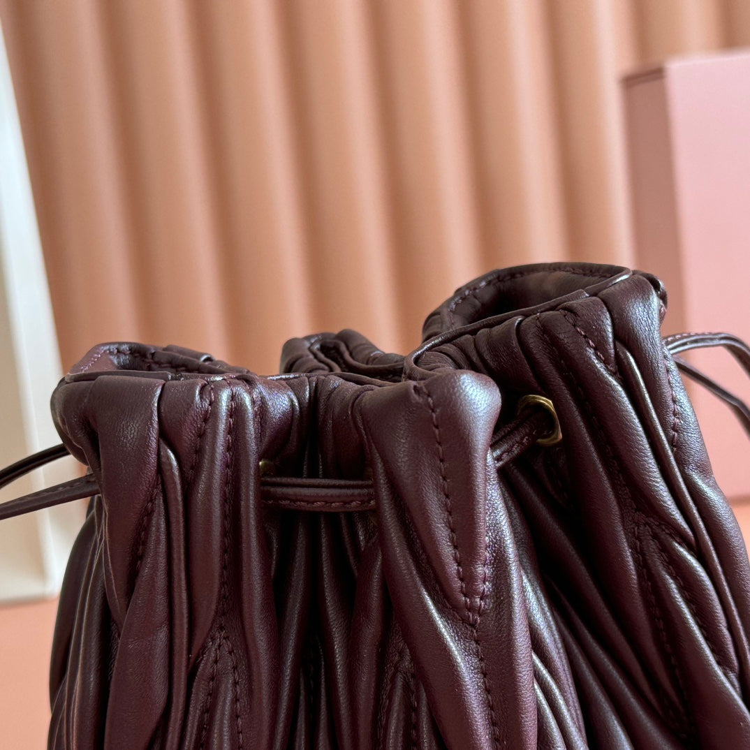 MIUMIU 26S MATELASSE POUCH BAG 16 IN DARK BROWN CALFSKIN GOLD HARDWARE