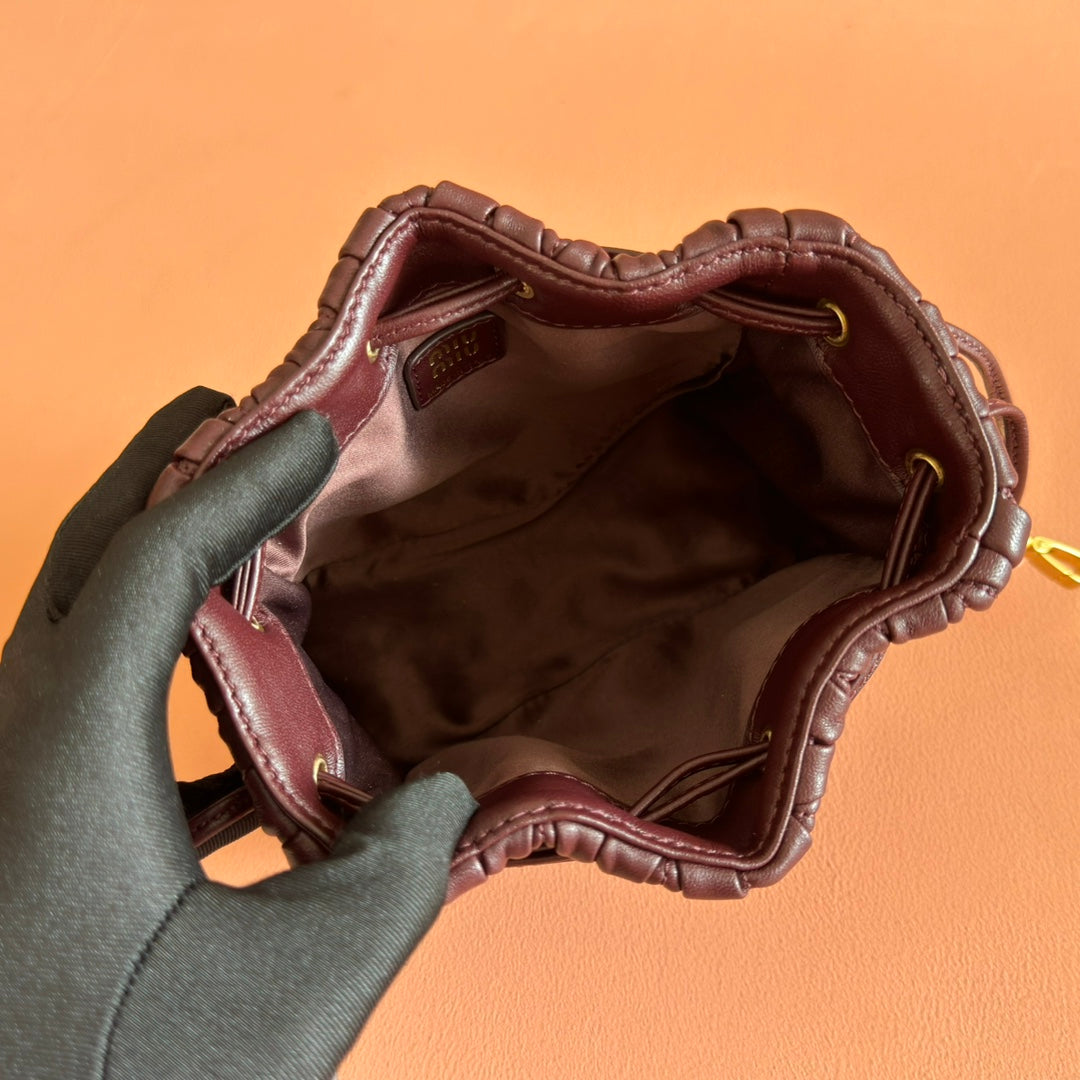 MIUMIU 26S MATELASSE POUCH BAG 16 IN DARK BROWN CALFSKIN GOLD HARDWARE