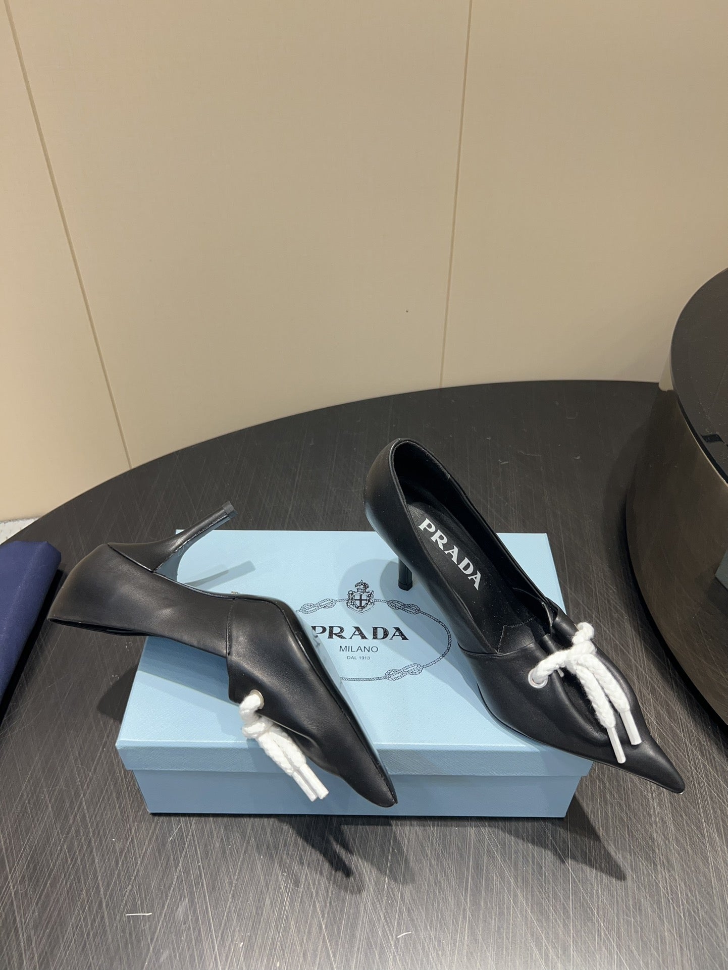 PRADA 25S POINTED TOE HIGH HEELS 85MM IN BLACK LAMBSKIN WITH TIE UP DESIGN