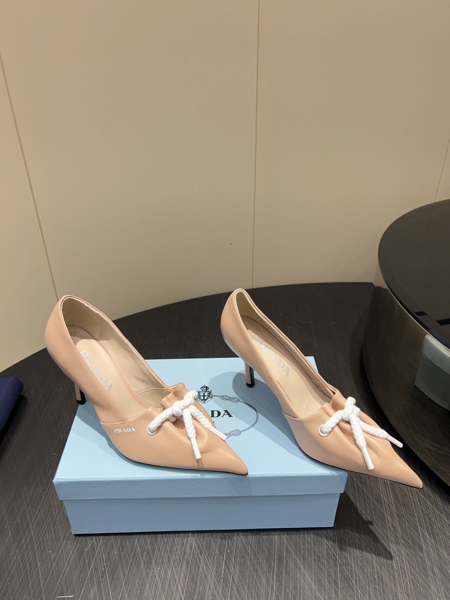 PRADA 25S POINTED TOE HIGH HEELS 85MM IN BEIGE LAMBSKIN WITH TIE UP DESIGN