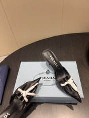 PRADA 25S BRAIDED DETAIL MULES 85MM IN BLACK CALFSKIN