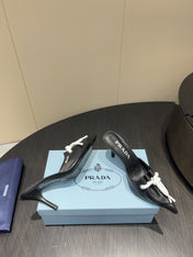 PRADA 25S BRAIDED DETAIL MULES 85MM IN BLACK CALFSKIN