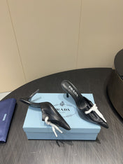 PRADA 25S BRAIDED DETAIL MULES 85MM IN BLACK CALFSKIN