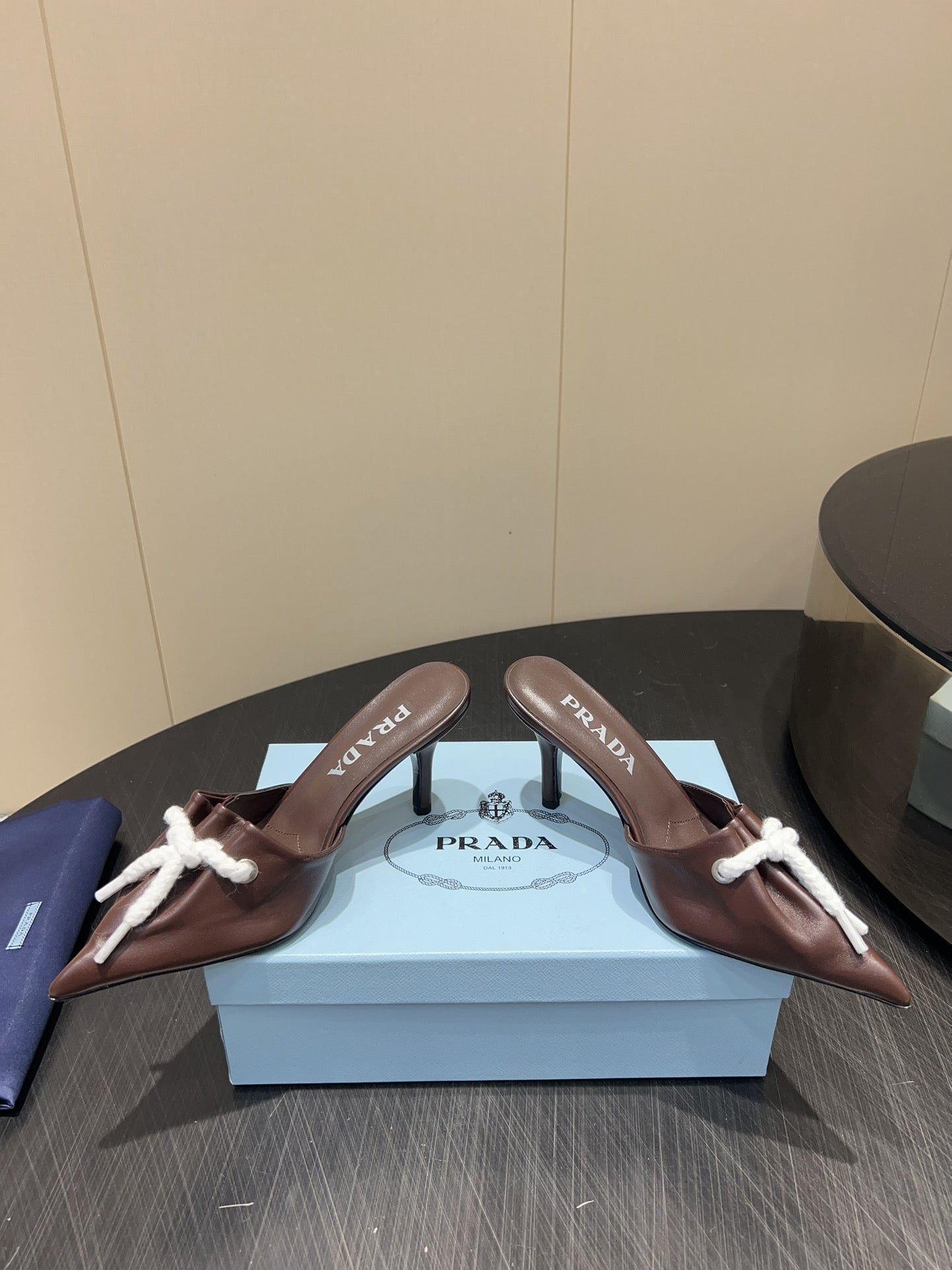 PRADA 25S BRAIDED DETAIL MULES 85MM IN DARK BROWN CALFSKIN