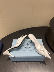 PRADA 25S BRAIDED DETAIL MULES 85MM IN WHITE CALFSKIN