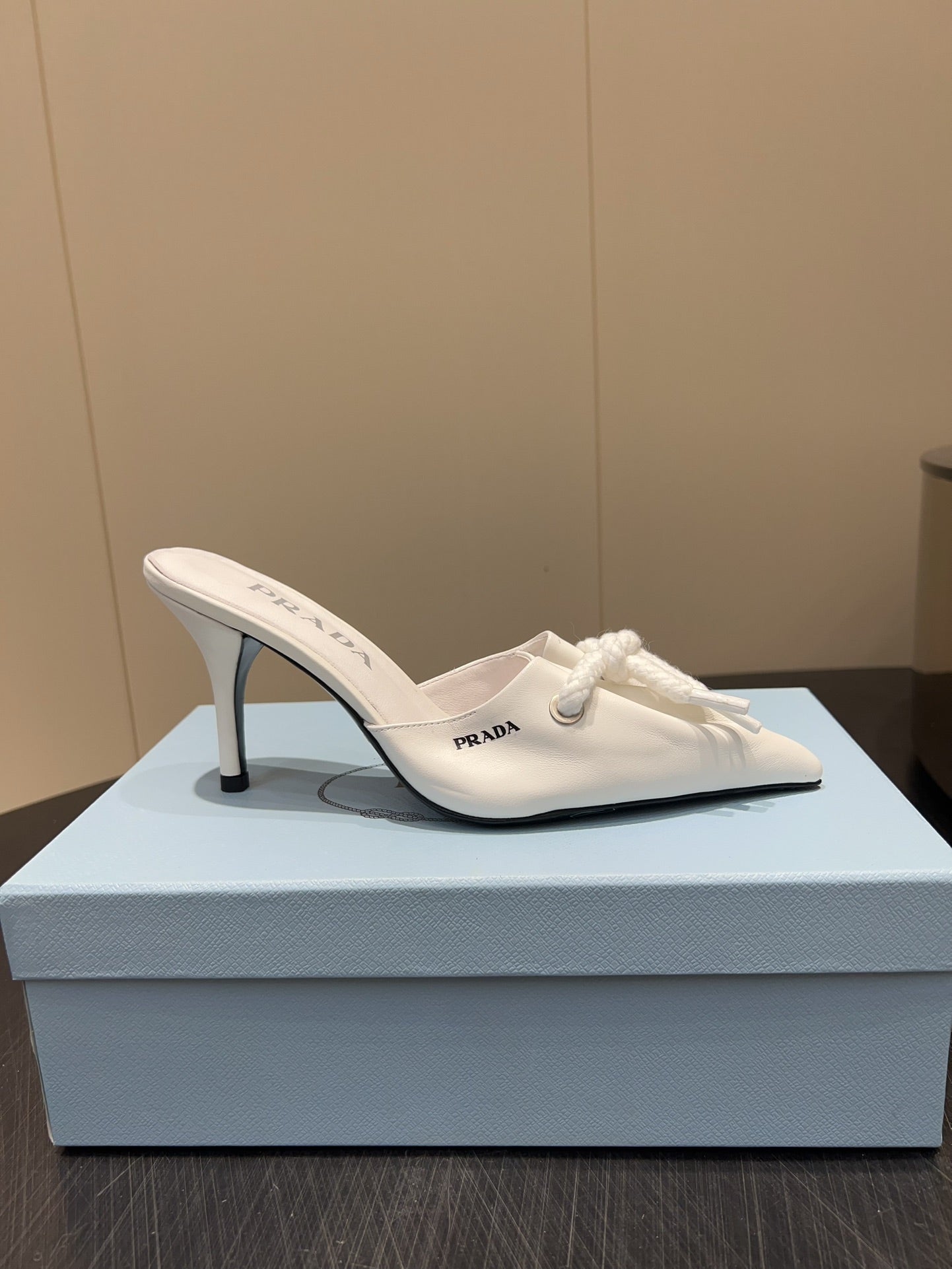 PRADA 25S BRAIDED DETAIL MULES 85MM IN WHITE CALFSKIN