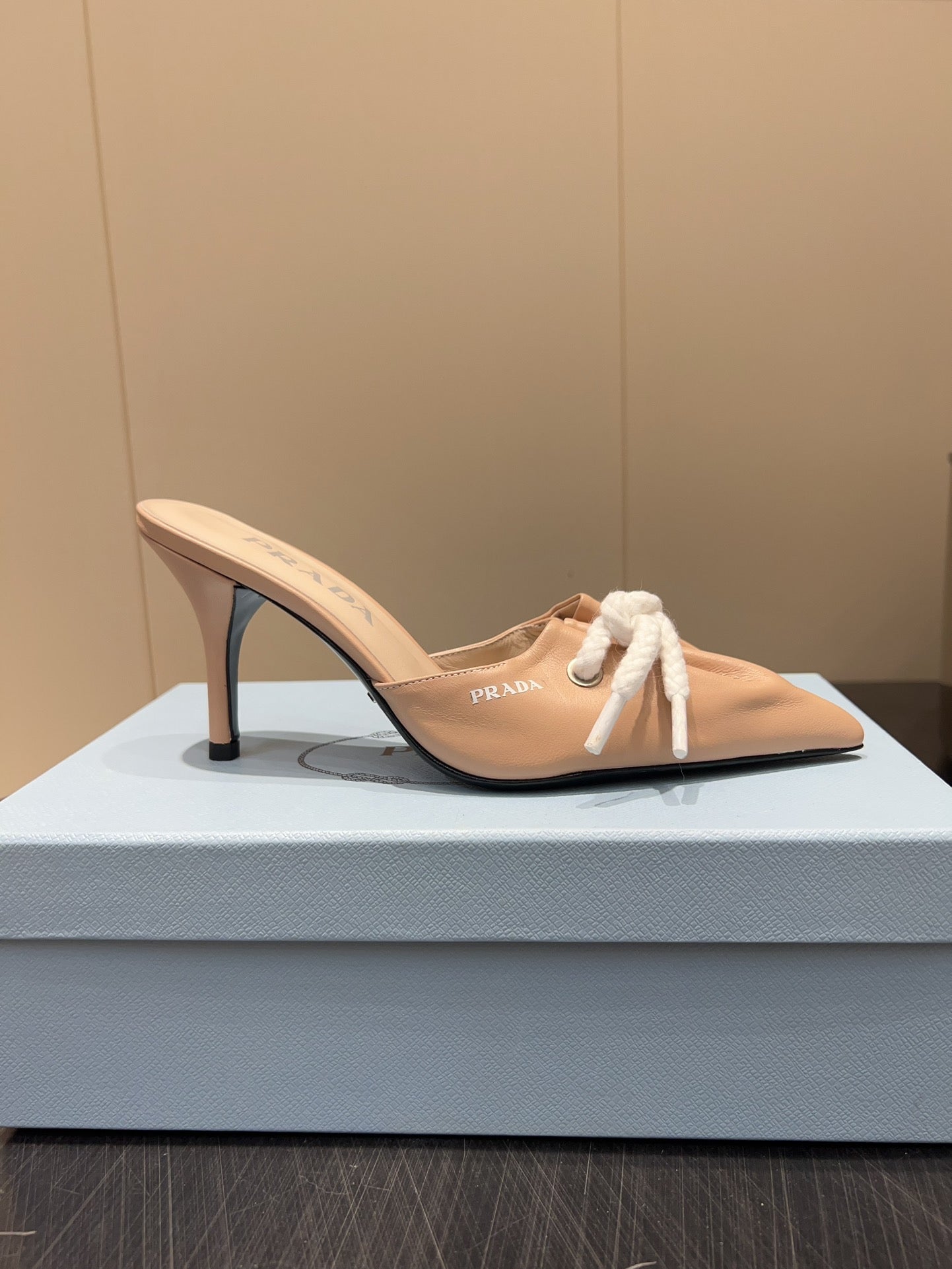 PRADA 25S BRAIDED DETAIL MULES 85MM IN BEIGE CALFSKIN