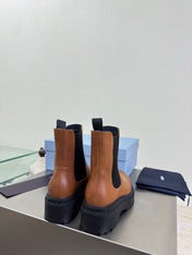 PRADA 25S PLATFORM CHELSEA BOOTS IN BROWN CALFSKIN
