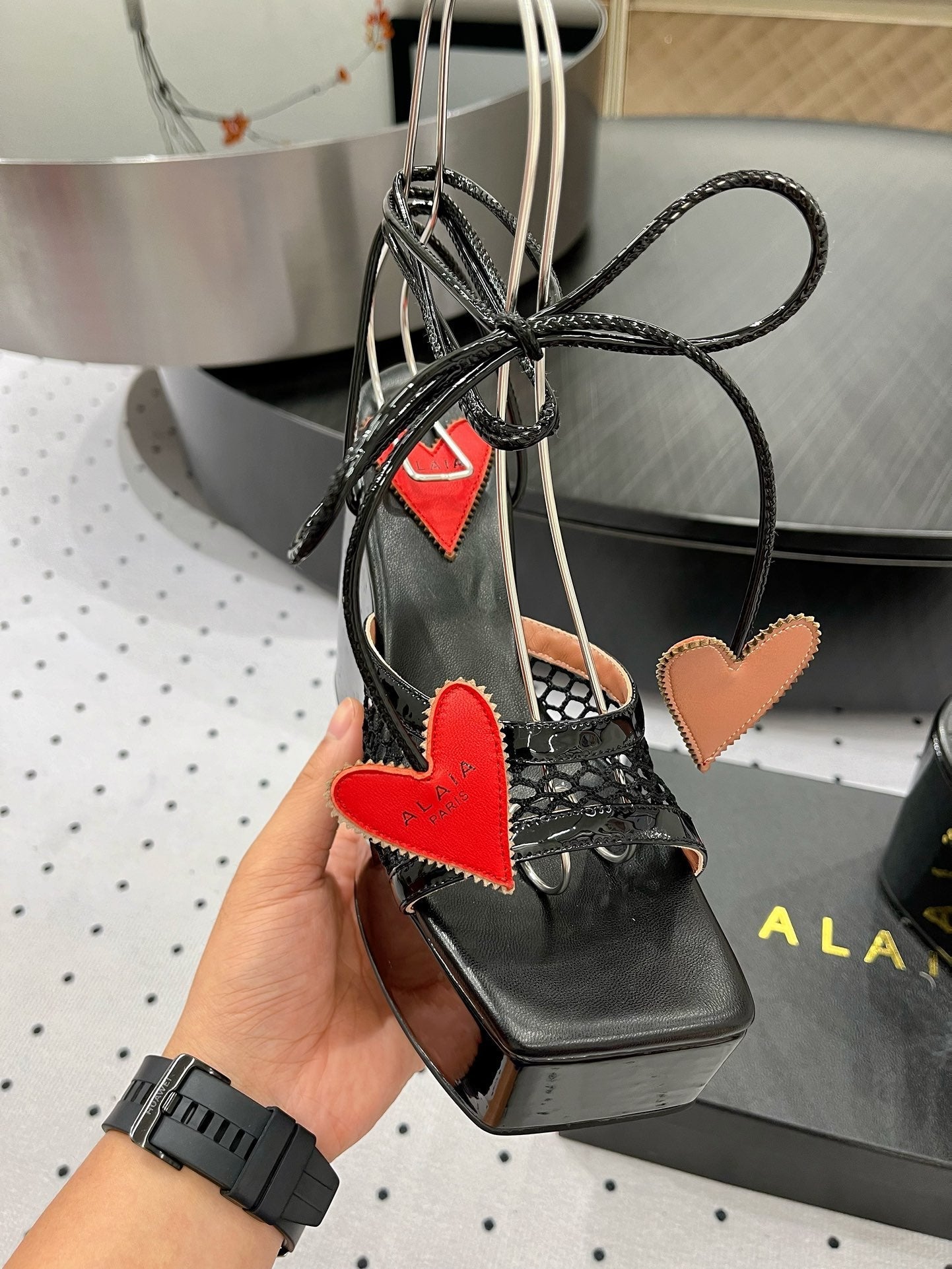 ALAIA BANQUET WEDGE SANDALS IN BLACK LAMBSKIN WITH RED HEART