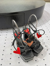 ALAIA BANQUET WEDGE SANDALS IN BLACK LAMBSKIN WITH RED HEART