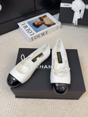 FLAT MARY JANE PUMPS IN WHITE MIX BLACK LAMBSKIN