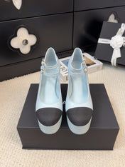 FLATFORM SANDAL IN LIGHT BLUE CALFSKIN AND BLACK FABRIC