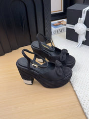 HIGH 12 CM PLATFORM SANDALS IN BLACK SUEDE