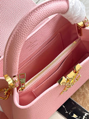 CAPUCINES EAST-WEST MINI 22 IN BLUSH PINK CALFSKIN GOLD HARDWARE