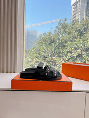 CHYPRE SANDAL IN BLACK CALFSKIN WITH STUDS