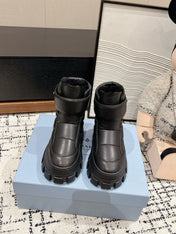 MONOLITH ANKLE BOOTS WITH STRAP IN BLACK CALFSKIN AND FLEECE LINING