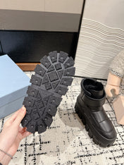 MONOLITH ANKLE BOOTS WITH STRAP IN BLACK CALFSKIN AND FLEECE LINING