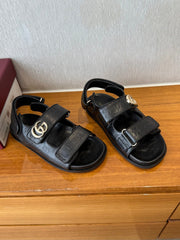 GG SANDALS S25 IN BLACK LAMBSKIN EMBOSSED LOGO WITH GOLD HARDWARE