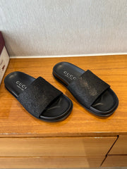 GG SLIDES IN BLACK SUEDE WITH EMBOSSED LOGO