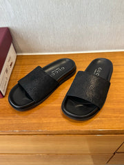 GG SLIDES IN BLACK SUEDE WITH EMBOSSED LOGO